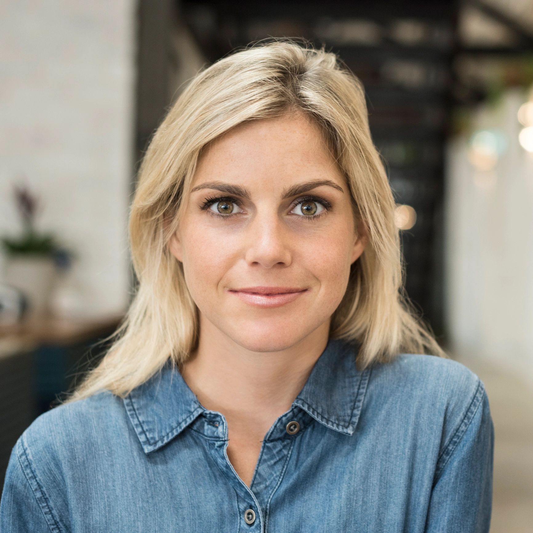 Portrait of smiling customer Emily
